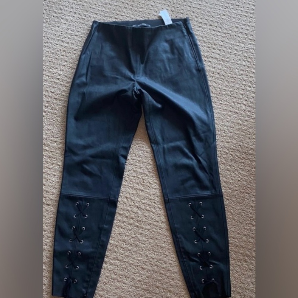 ZARA—-Black Faux Leather Leggings with Lace up at‎ bottom front.